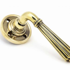 From the Anvil Aged Brass Hinton Lever on Rose Set - 45309