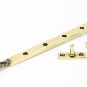 From the Anvil Aged Brass 10" Hammered Newbury Stay - 46145
