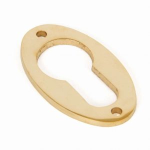 From the Anvil Polished Brass Oval Euro Escutcheon - 83815