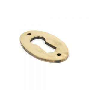 From the Anvil Aged Brass Oval Escutcheon - 83818