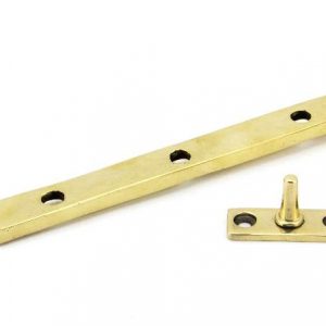 From the Anvil Aged Brass 10" Avon Stay - 90427