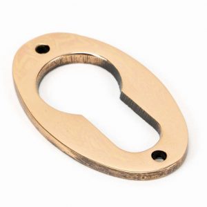 From the Anvil Polished Bronze Oval Euro Escutcheon - 91928