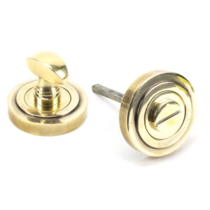 From the Anvil - Aged Brass Round Thumbturn Set (Art Deco) - 45732